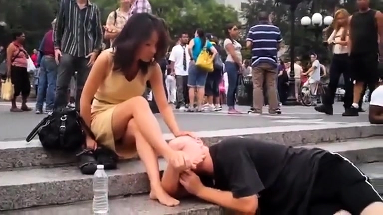 Foot Public Porn - Gorgeous Brunette Babe Has A Guy Licking Her Feet In Public ...