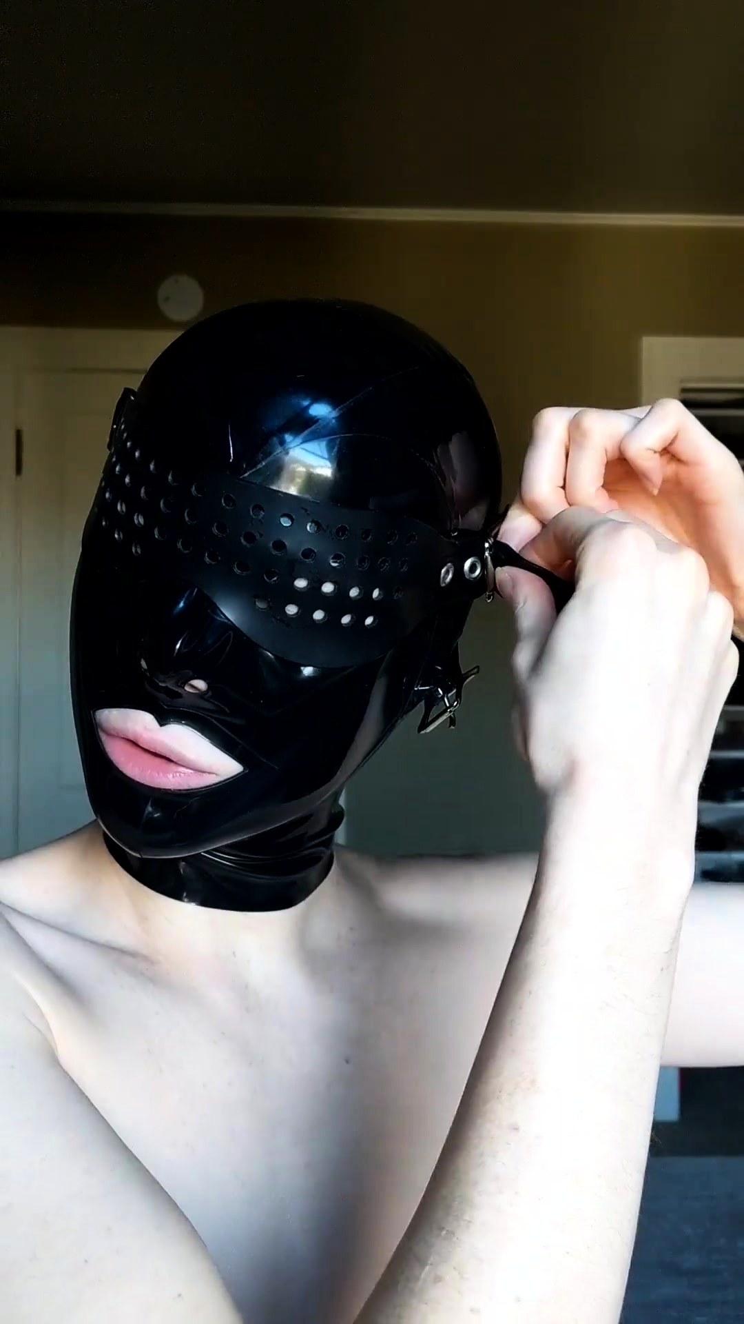 Beautiful Amateur BDSM Fetishist Trying On Latex Hood Mask Video at Porn picture